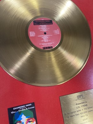 Lot 338 - 10CC - BPI AWARD PRESENTED TO LOL CREME.