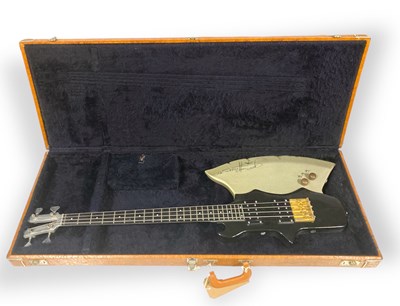 Lot 526 - KISS - A 1980 KRAMER AXE BASS SIGNED BY GENE SIMMONS.