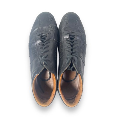 Lot 257 - TALKING HEADS INTEREST - A PAIR OF SHOES OWNED, WORN AND SIGNED BY DAVID BYRNE.