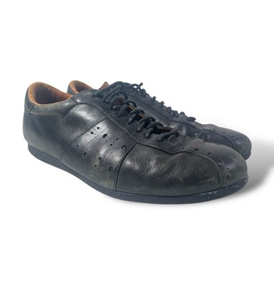 Lot 257 - TALKING HEADS INTEREST - A PAIR OF SHOES OWNED, WORN AND SIGNED BY DAVID BYRNE.