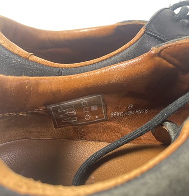 Lot 257 - TALKING HEADS INTEREST - A PAIR OF SHOES OWNED, WORN AND SIGNED BY DAVID BYRNE.