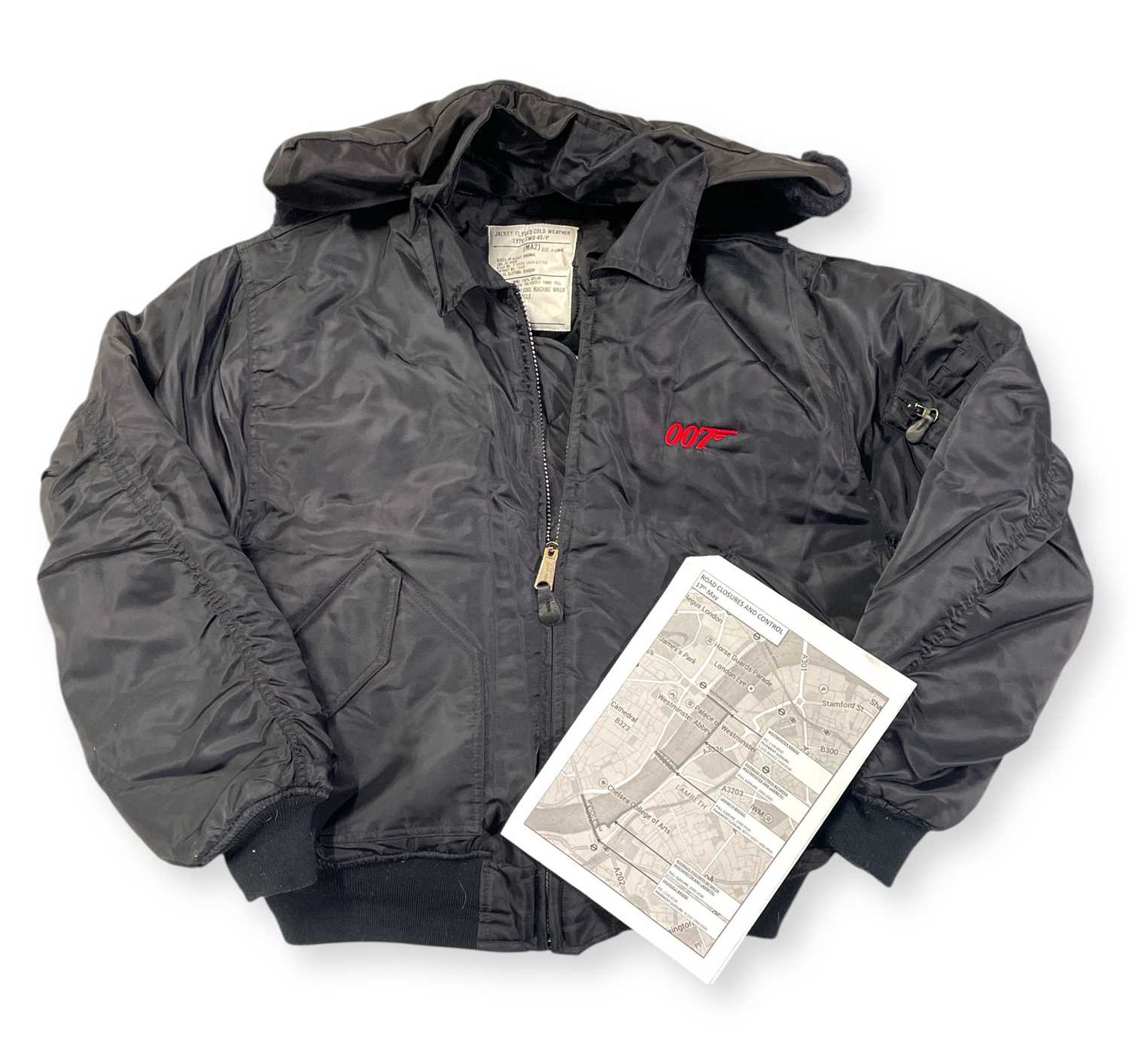 Lot 83 - JAMES BOND - CAST AND CREW JACKET FROM 'WORLD IS NOT ENOUGH' (1999) / SPECTRE PRODUCTION DOCUMENT.