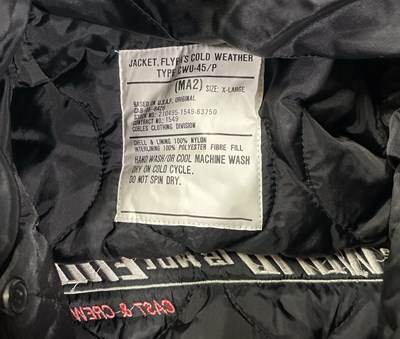 Lot 83 - JAMES BOND - CAST AND CREW JACKET FROM 'WORLD IS NOT ENOUGH' (1999) / SPECTRE PRODUCTION DOCUMENT.