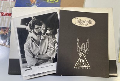 Lot 385 - DAVID BOWIE IN LABYRINTH - MEMORABILIA INC FILM BOOKS AND PRESS KIT.