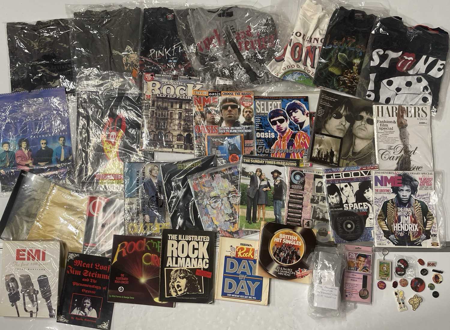 Lot 82 - MUSIC MEMORABILIA INC T-SHIRTS / BOOKS / MAGAZINES.