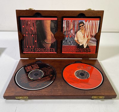 Lot 84 - PROMOTIONAL BOX SETS INC BRUCE SPRINGSTEEN HUMAN TOUCH/LUCKY TOWN WOODEN CD SET.