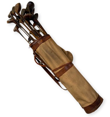 Lot 318 - GOLF - VINTAGE CLUBS IN LEATHER BAGS.