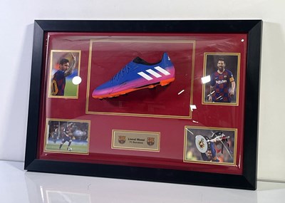 Lot 300 - LIONEL MESSI - SIGNED BOOT PRESENTATION.