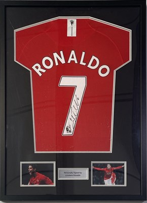 Lot 301 - FOOTBALL - CRISTIANO RONALDO - SIGNED SHIRT PRESENTATION.