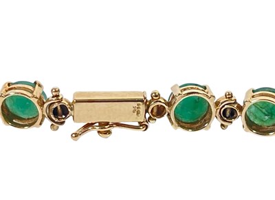 Lot 5 - GOLD JEWELLERY - EMERALD RING AND BRACELET.