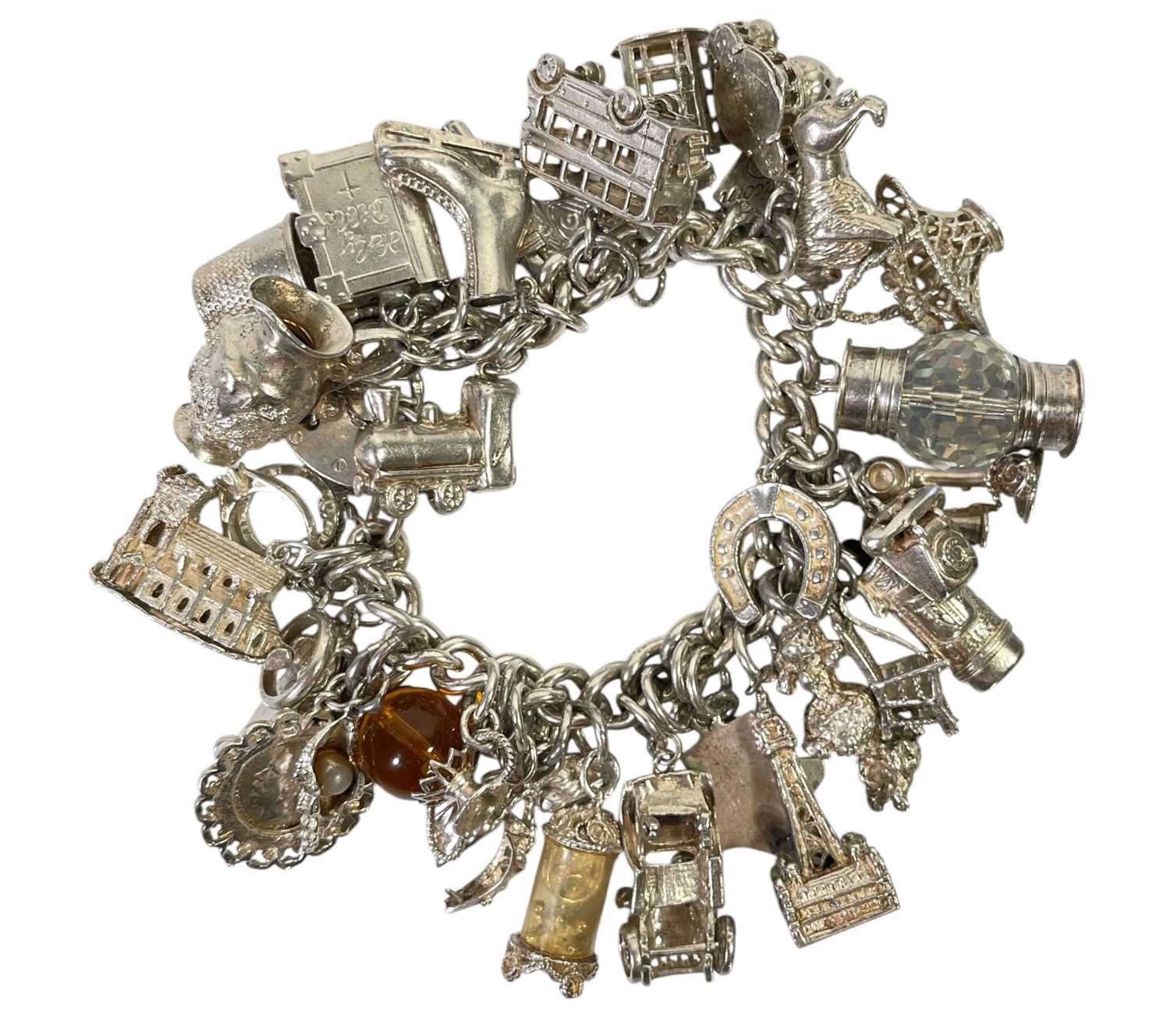 Lot 14 - SILVER CHARMS.