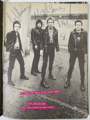Lot 412 - THE CLASH - FULLY SIGNED SONGBOOK PAGE.