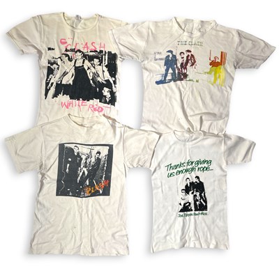 Lot 413 - THE CLASH - A GROUP OF VINTAGE T-SHIRTS.