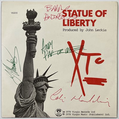 Lot 338 - XTC - SIGNED COPY OF 'STATUE OF LIBERTY'.
