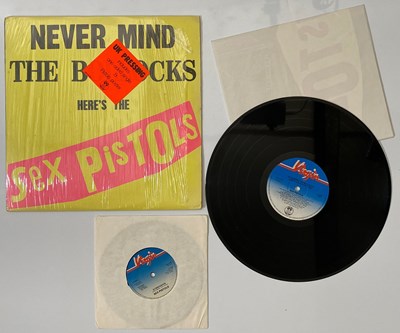Lot 240 - SEX PISTOLS - NEVER MIND THE BOLLOCKS LP (COMPLETE ORIGINAL COPY WITH POSTER AND 7" - 'SPOTS 001')