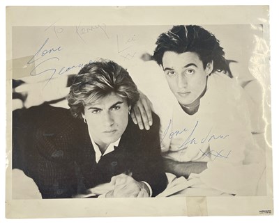 Lot 178 - WHAM - GEORGE MICHAEL AND ANDREW RIDGELEY SIGNED PHOTO.